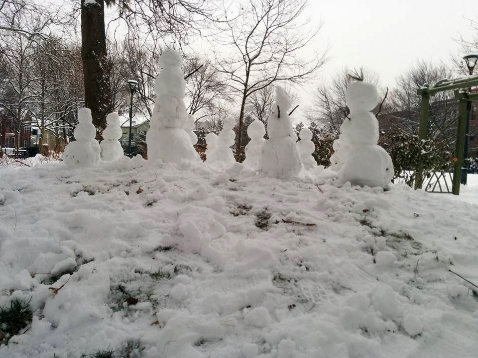 A group of small snowpeople in Cambridge, MA last year